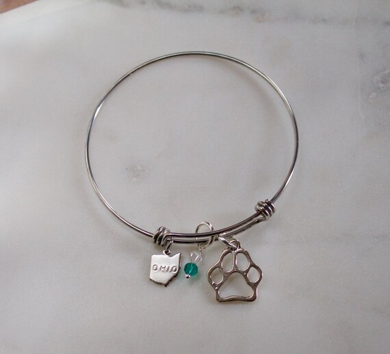 Ohio University Charm bracelet. Ohio State Charms. Ohio Bracelet. Ohio Bobcats. Ohio state. OU charm. Stainless Steel Bracelet. Item # 120