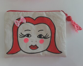 Pouch with girl face.