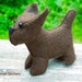 small brown stuffed dog