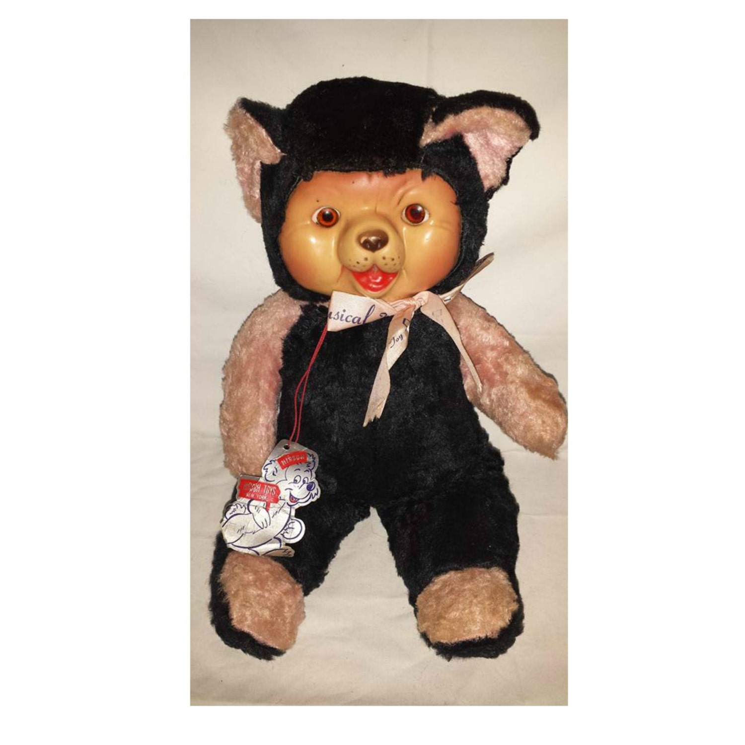 vintage rubber face bear