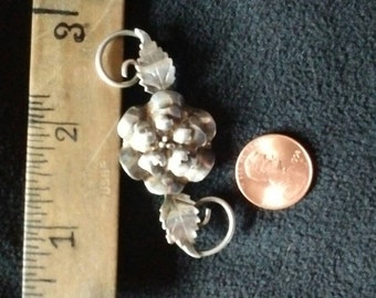 Beautifully detailed brooch. Sighed Aucello