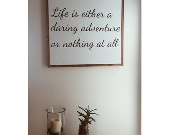 Life is either a daring adventure or nothing at all - quote sign