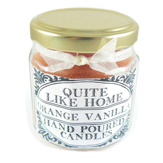 Orange Vanilla scented 4 oz. jar candle with gold lid