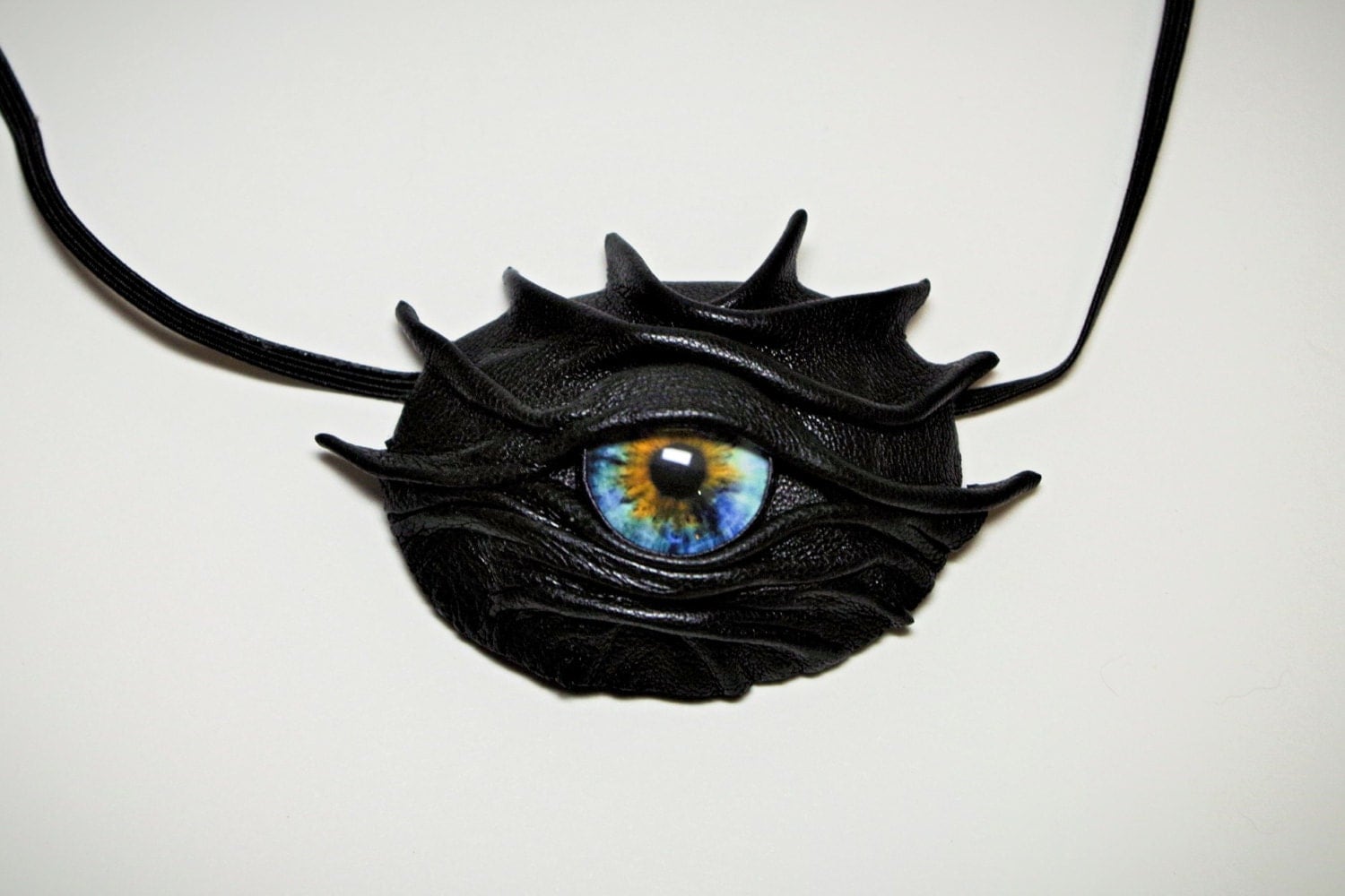 Dragon eye eyepatch black leather. Gothic style eye patch.