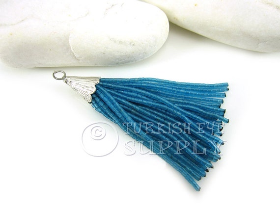 translucent aqua blue afghan heishi seed beaded tassel earring translucent aqua blue afghan heishi seed beaded tassel earring