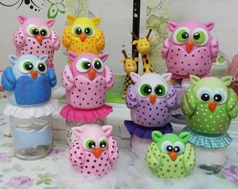 Bottles with porcelain owls