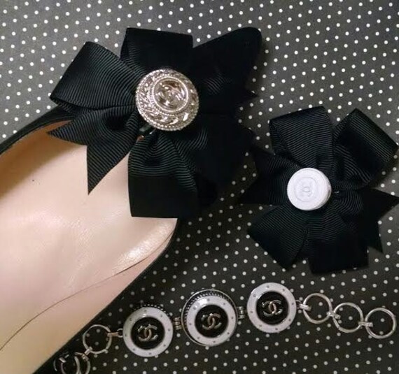 Classic Shoe Clips. Set of four Chanel buttons in silver and