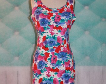 Items similar to Aqua color sleeveless top with 2 roses decoration and ...