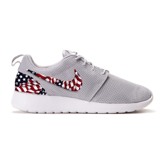 red white and blue nike roshe run