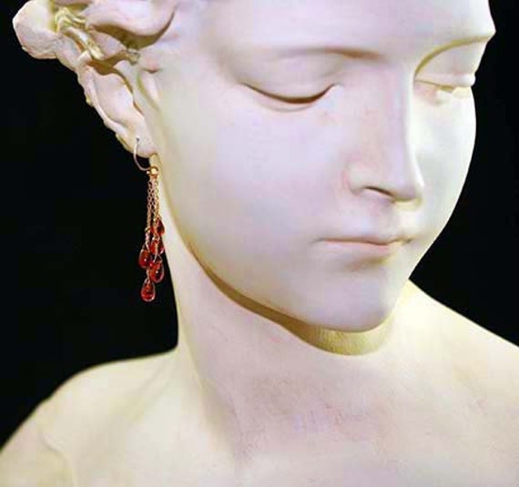 Earrings with garnet drops and gold chain