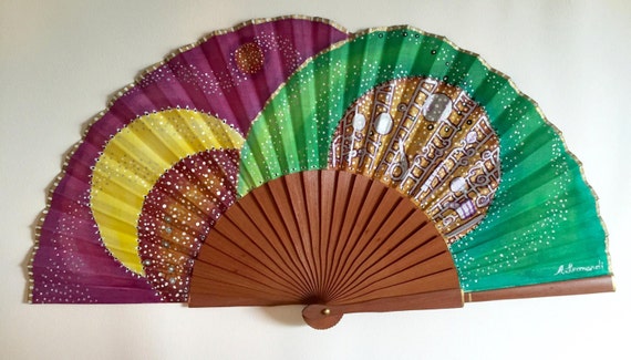 Accessory hand fan hand painted with watercolors. Unique best