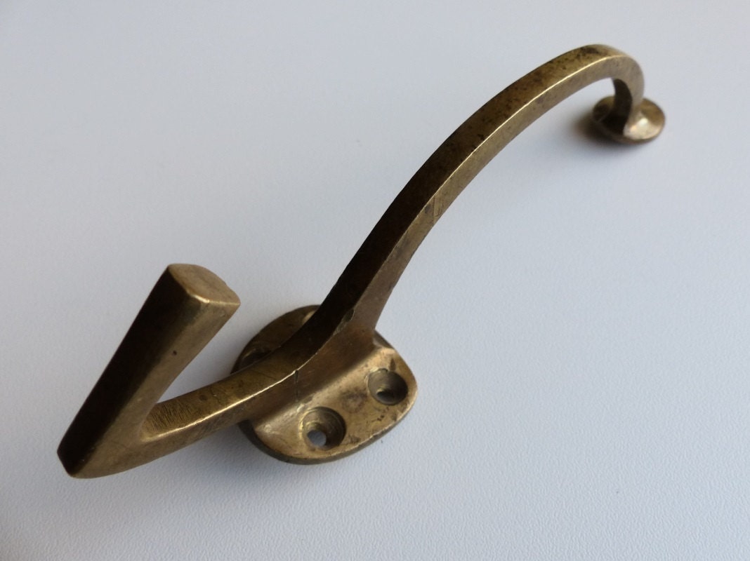 Antique solid brass Bronze wall hanger / Art by AnteBellumTreasure