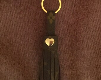 Upcycled Louis Vuitton tassel made from authentic Louis Vuitton canvas, gold key ring and gold heart rivet
