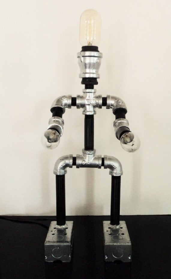 A stunning steampunk Robot pipe lamp sculpture by CoreyEllisArt