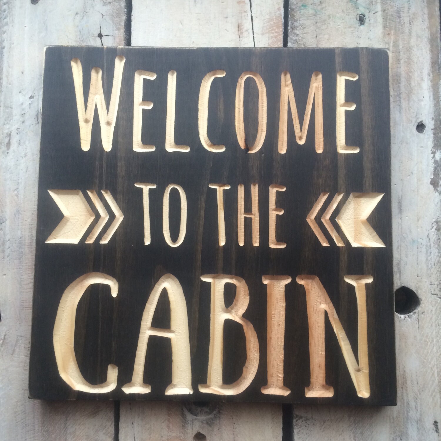 to the CABIN sign carved wood sign by KnotsAndBoltsVintage