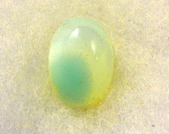 18.5 cts ...... Aqua Blue Chalcedony Cabochon ... 20 x 14 x 9 MM