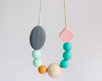 Teething Necklace, breastfeeding and teething jewellery BPAfree chewable silicone beads with natural wooden bead by Mustard & Mint New Baby