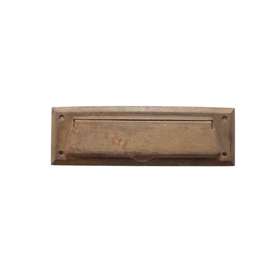 Mailbox slot in wall