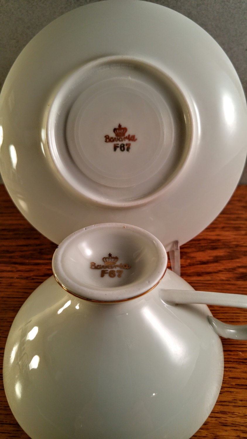 Bavarian China Pedestal Cup and Saucer. Hand Painted Gold