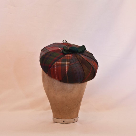 Handmade round pleated tartan hat decorated with velvet bow, button and kilt pin