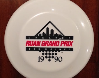 Vintage 1990 Greater Des Moines Ruan Grand Prix Souvenir Enduro Flying Toy Frisbee. Terrific red and black graphics. Measures approximately