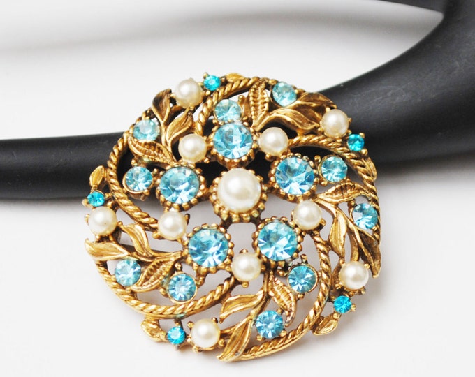 Blue Rhinestone and White Round Brooch Mid century gold floral Pin