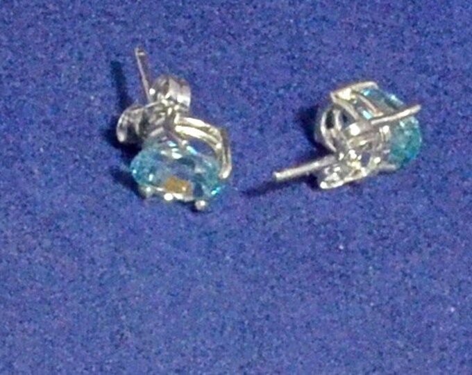 Blue Zircon Studs,7x5mm Oval, Natural, Set in Sterling Silver E946