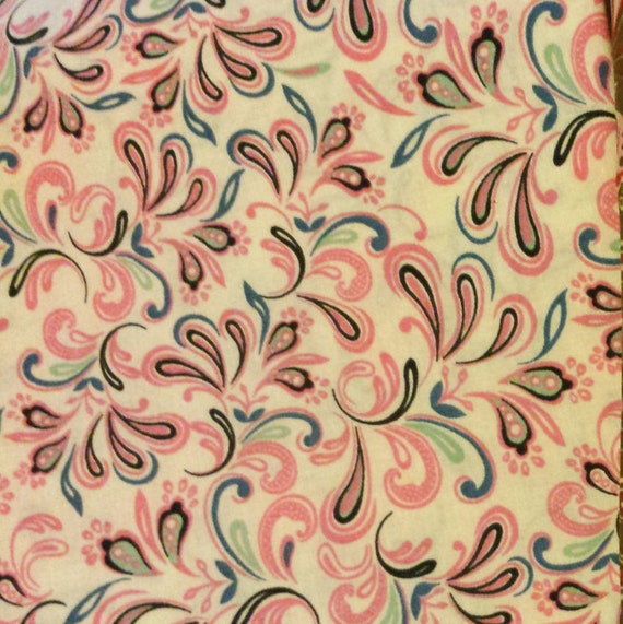 light pink background with pink blue and light green swirl