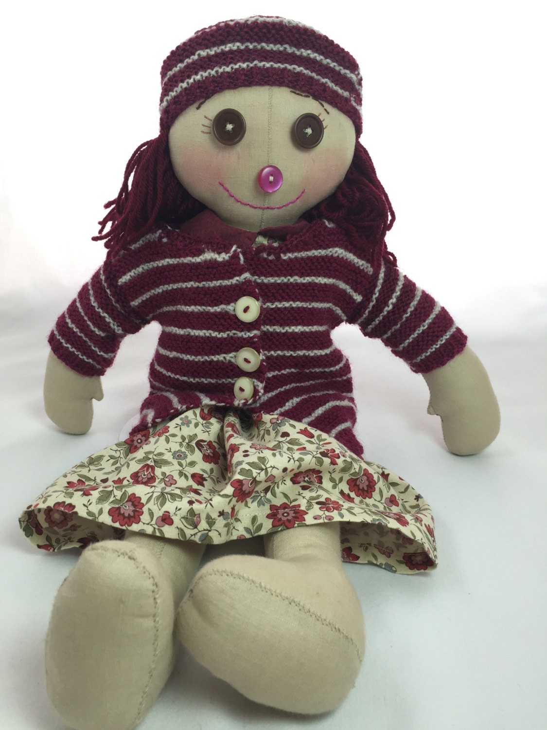 rag doll with button eyes