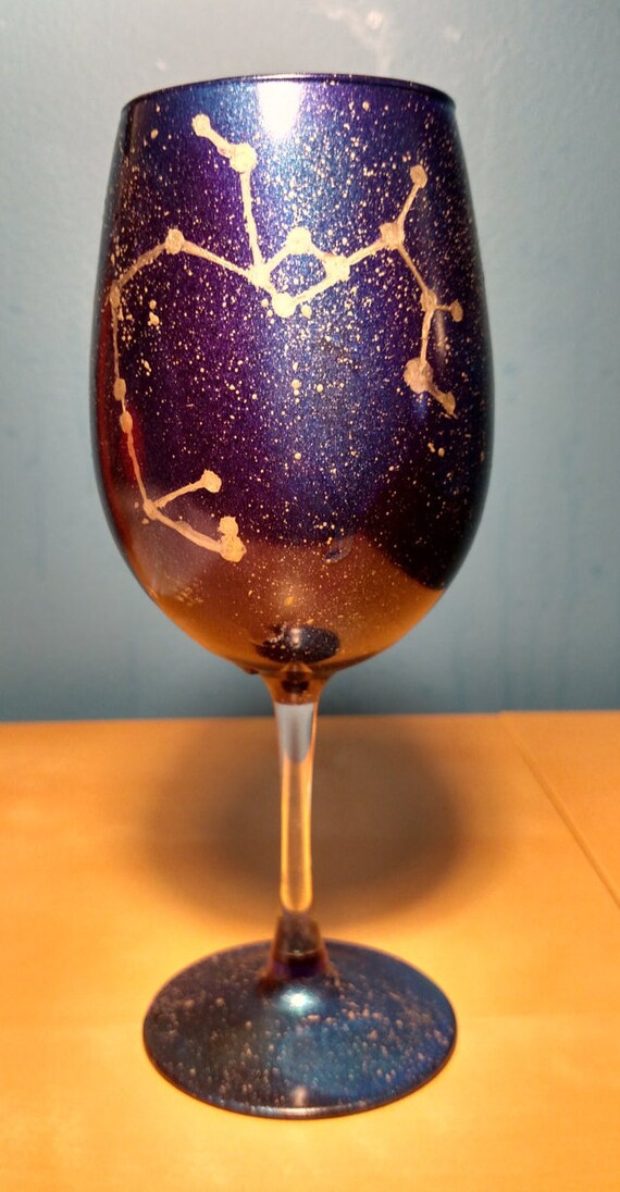 Galaxy painted wine glass with constellations