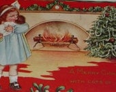 Pretty Little Girl Kissing Baby in Front of Fireplace With Christmas Tree Vintage Whitney Made Postcard