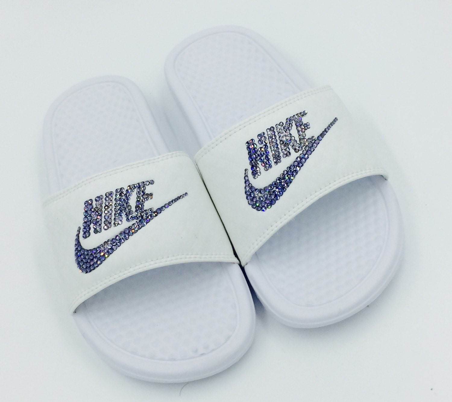 white nike flip flops womens