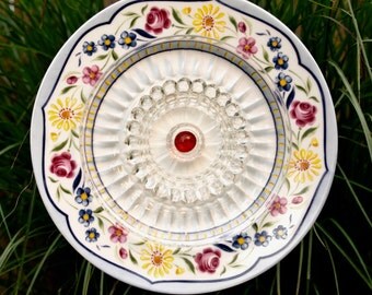 Items similar to Glass Plate Flower Garden Art - Make a Statement By