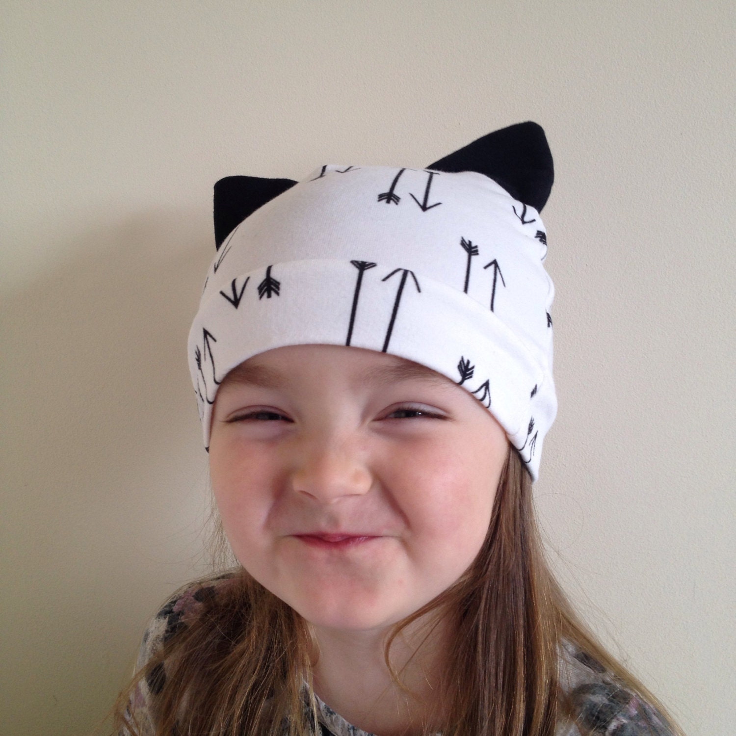 Cat ears baby hat. Unisex hat with arrows and cat ears in