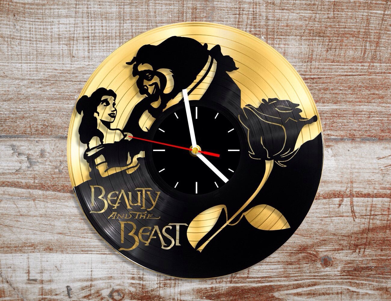 Beauty and the beast vinyl wall clock. Gold record.