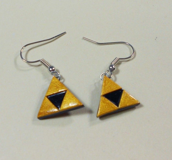 Items similar to The Legend Of Zelda triforce dangly earrings Nintendo