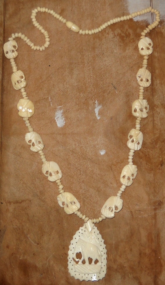 Ivory Colored Carved Bone Elephant Necklace with Beads