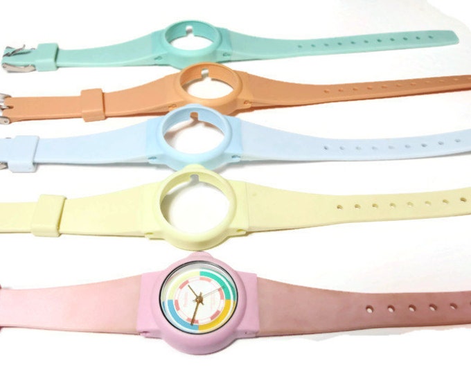 Armitron working interchangeable watch,"The Cassette" pastel colored interchangeable strap parts can be mixed to make over 100 combinations