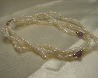 Genuine Freshwater Rice Pearl, Amathyst Triple Strand Bracelet 14kt gold. 1364