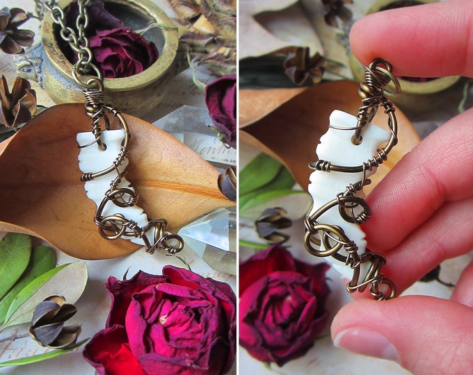 Unisex carved bone necklace "Dragon Rider" with wire wrapped dragon claw pendant. Custom chain length.