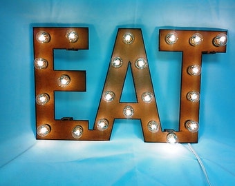 Eat Marquee Lighted Sign Made out of Rusted metal