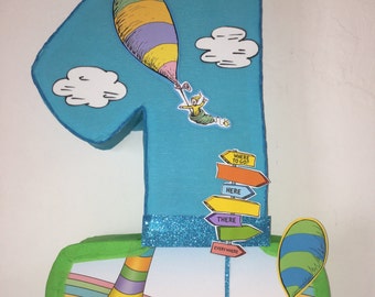 oh the places you'll go pinata inspired. oh the places you'll go birthday Party. Cat in the hat decoration.