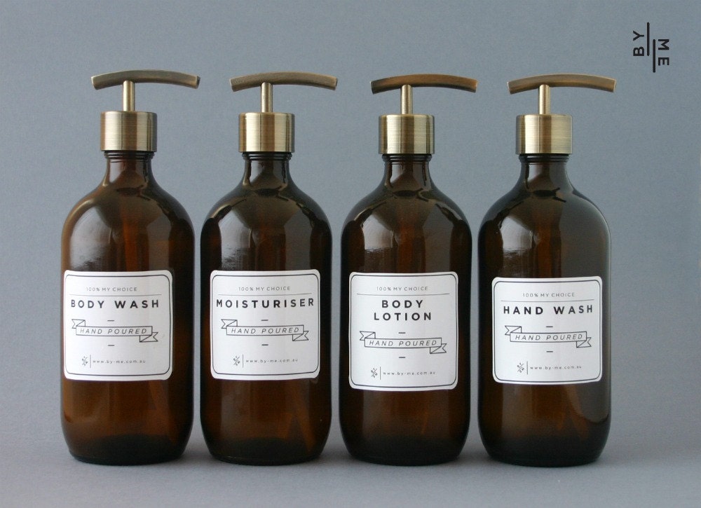 Amber glass bottle soap dispenser with metal pump and designer