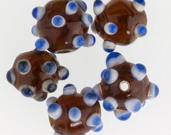 Amber round with white and blue horns. 12mm Pkg of 6. b11-mi-0107(e)