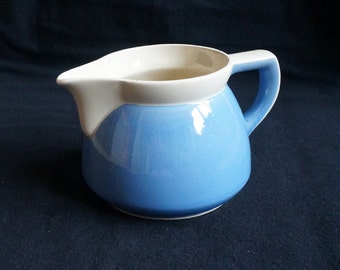 Rare vintage stoneware creamer milk pitcher (might be Waku Germany), cream coloured with light blue, very nice shape , midcentury, big model