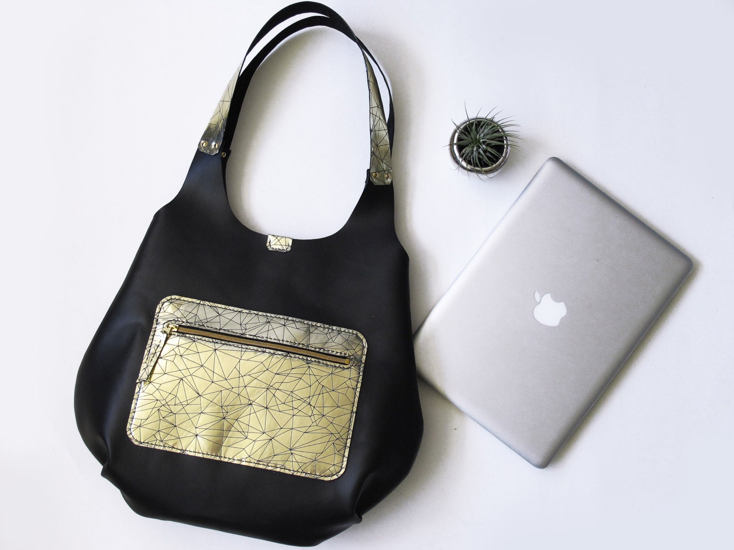 black and gold hobo bag