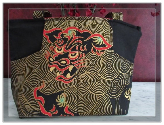 Over the shoulder pocketbook dragon Handbag-zippier bag with some bling handbag black with gold details and a vivid red lining fabric bag
