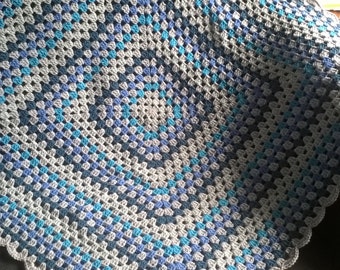 Crocheted granny square baby blanket