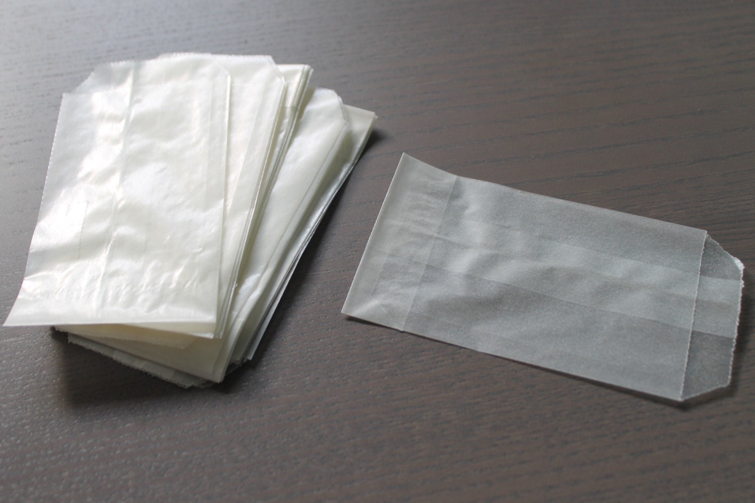 Transparent white parchment paper packets. White Transparent