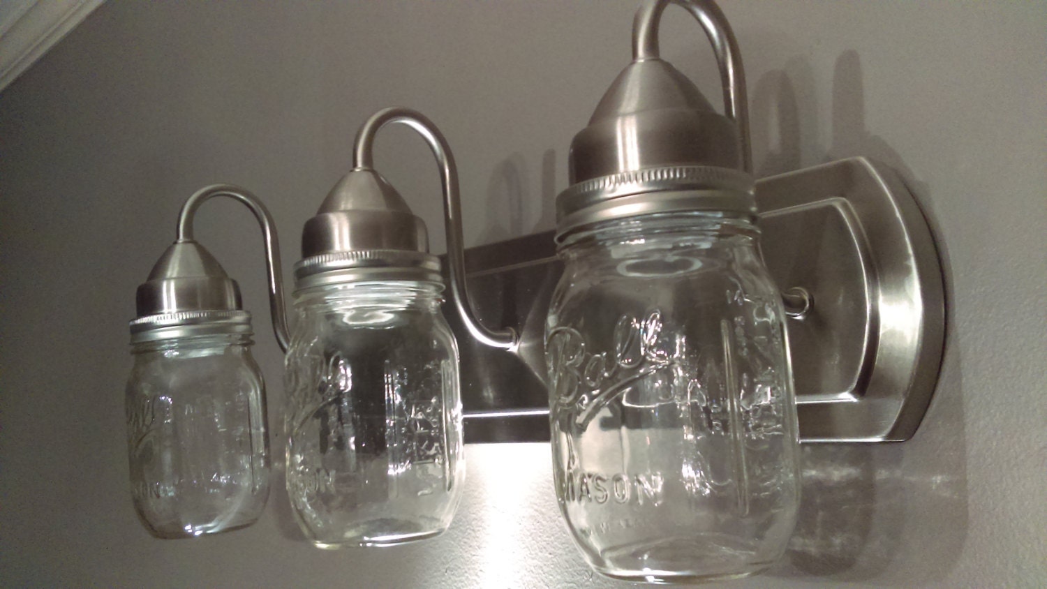 Brushed Nickel Finish 3 light Mason Jar Light Fixture. Vanity